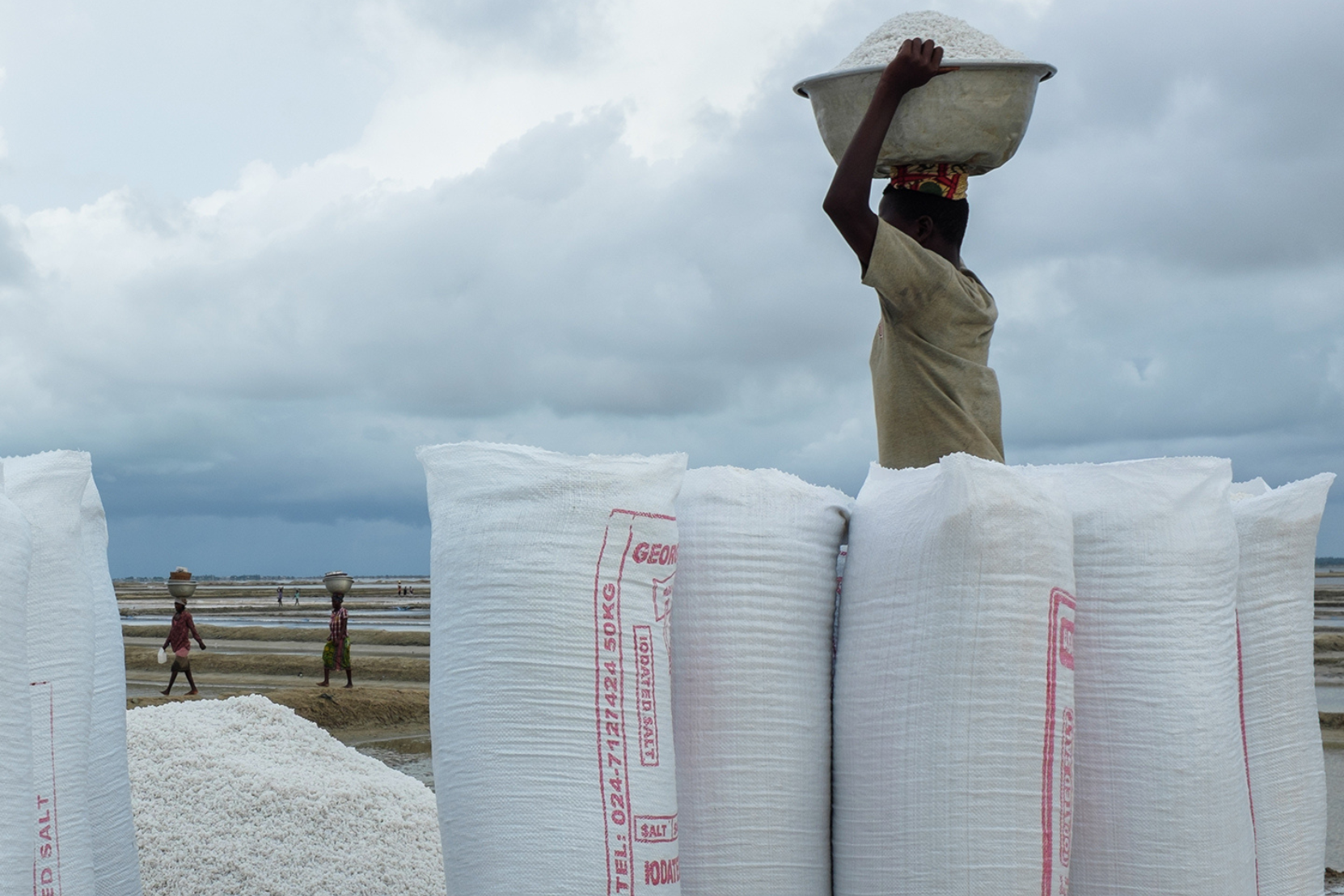 A woman carrying iodized salt